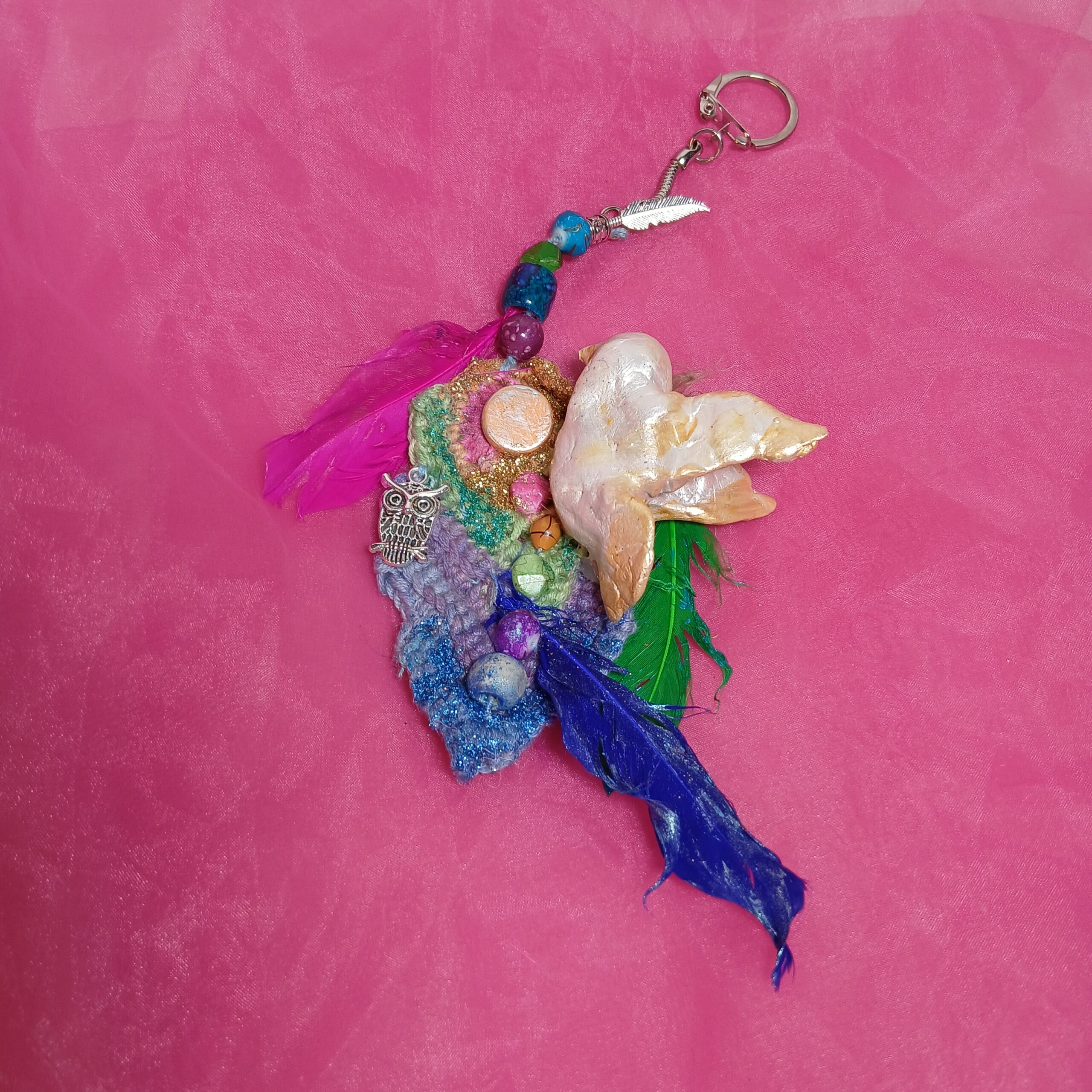 Porte-clés oiseau et plumes